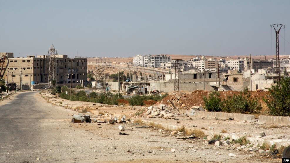 Damaged roads and abandoned buildings in Aleppo's rebel-held Kalasa neighborhood following months of air strikes.