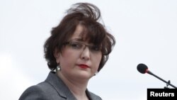 Defense Minister Tina Khidasheli is one of just four new names in the cabinet.