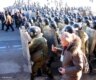 Belarusian correspondent Maksim Kapran covers a protest as riot police march in to shut it down.