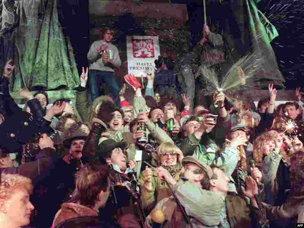 On December 31, 1989, champagne corks pop in celebration of the new year and a new democracy.