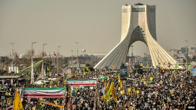 Iranians attend a rally in Tehran to mark the 34th anniversary of the Islamic revolution on February 10.