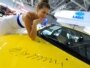 Russia -- Lada Kalina Sport with Putin's autograph on its hood is presented at the Moscow Automobile Salon, 02Sep2010