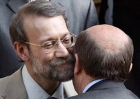 Ali Larijani (left) greeting Igor Ivanov in Tehran on October 3 (Fars)