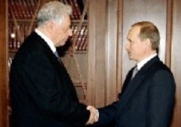 Russian President Putin (right) at the farewell ceremony for President Magomedali Magomedov last week (AFP)