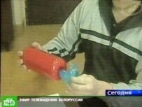 Belarus state-run TV showed a makeshift container it said was used to transfer information across the border (file) (NTV)
