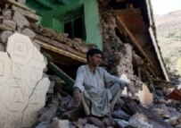 An earthquake survivor in Indian Kashmir (AFP)