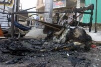 Damage from a July 20 roadside-bomb attack in Baghdad that killed two and wounded 12 (epa)