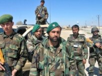 Afghan police and troops, like these National Army soldiers, have been unable to restore security in Helmand