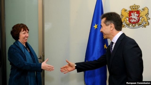 Georgian Prime Minister Bidzina Ivanishvili meets with EU foreign-policy chief Catherine Ashton in Tbilisi on November 26. "Investigations into past wrongdoings must be -- and must be seen to be -- impartial, transparent, and in compliance with due process,” Ashton said.