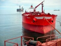 A tanker docks with a floating oil storage facility, part of the Sakhalin-2 project (ITAR-TASS)