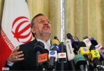 Iranian Foreign Minister Manuchehr Mottaki at a 28 January news conference (Fars)