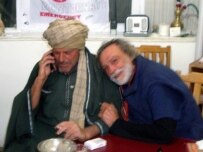 Journalist Mastrogiacomo (left) with Emergency head Strada shortly after the former's release on March 19 (epa)