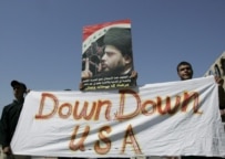 Al-Sadr supporters demonstrating in June 2006 against U.S. raids in Shi'ite neighborhoods (epa)