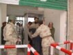 A Pakistani paramilitary troop frisks a Pashtun tribesman as he crosses the border