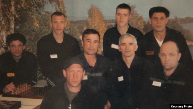 Valentin Danilov (middle row, second from right) and other inmates in their Siberian prison (undated)