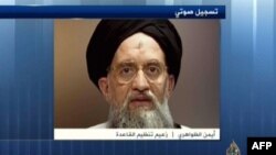 На кадре из видео — глава «Аль-Каиды» Айман аль-Завахири.
