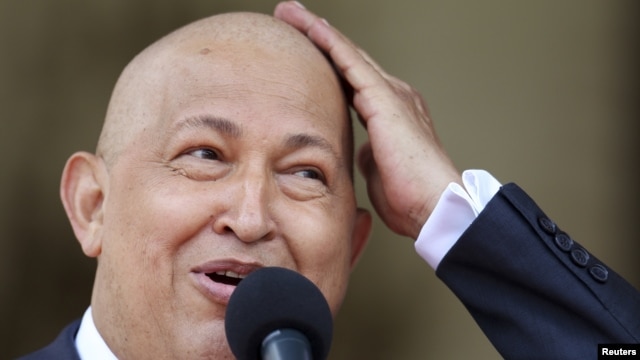 Venezuelan President Hugo Chavez joked about his lack of hair during cancer treatment while talking to reporters at Miraflores Palace in Caracas in 2011.