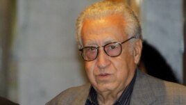UN-Arab League peace envoy for Syria Lakhdar Brahimi arrives at a hotel in Damascus on October 19.