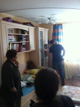 Police raid the apartment of opposition figure Aleksei Navalny on June 11.