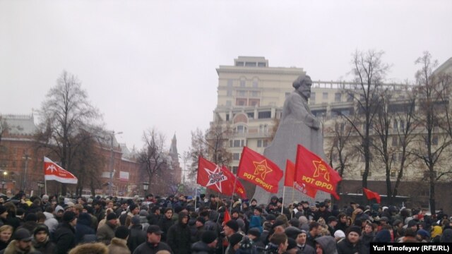Demonstrators gather near the Russian State Duma on December 10 to protest alleged violations in last week's parliamentary elections. 