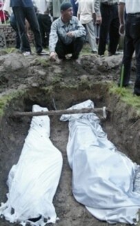 Victims of the crackdown at Andijon are buried on May 14, 2005.