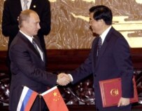 Putin (left) and Hu have a lot to discuss (file photo) (ITAR-TASS)