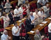 Georgian lawmakers applauding after today's vote (epa)