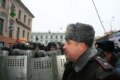 A commander girds his security forces, who are on hand to block marchers\' path to the Central Election Commission building in Moscow on November 24