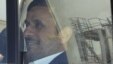 Iranian President Mahmud Ahmadinejad sits in a vehicle as he visits an industrial site in Kerman Province in January.