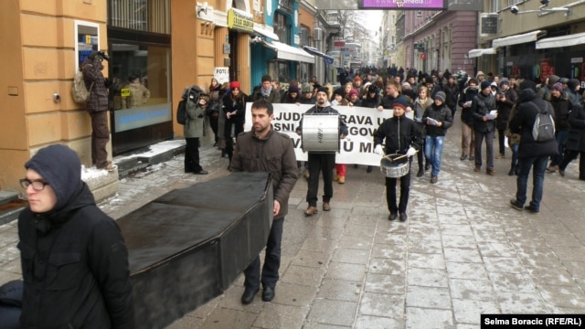 The group held a symbolic funeral for human rights in Sarajevo on December 10.