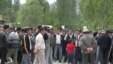Residents of the village of Sogment gather at the Kyrgyz-Uzbek border. Political tensions often mean that enclave residents are cut off from the wider world.