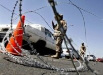 Iraqi soldiers man a checkpoint in central Baghdad (AFP)