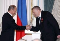 Nationalist politician Vladimir Zhirinovsky (right) receiving a state decoration from President Putin in the Kremlin in April (epa)