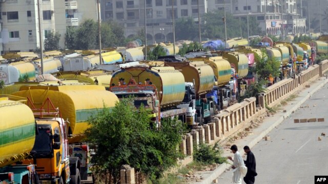 NATO tankers are parked near oil terminals in the port city of Karachi after Pakistani authorities shut vital NATO supply routes into Afghanistan.