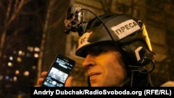 Ukraine -- RFE/RL correspondent Andriy Dubchak reporting from a protest near the General Prosecutor's Office of Ukraine in Kyiv, December 4, 2013.