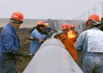 Workers on the Atyrau-Samara pipeline in Kazakhstan (file photo)