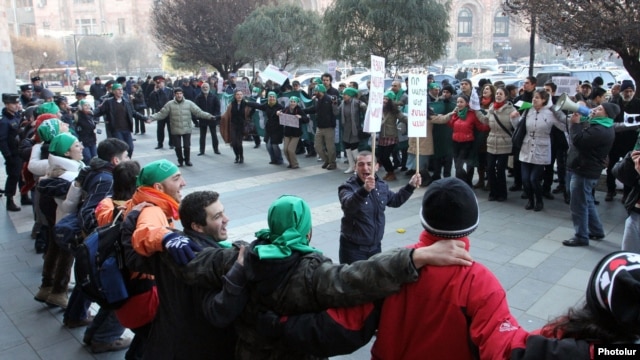 Armenia - Environmental activists demonstrate outside a government building in Yerevan against mining in Syunik, 29Dec2011.