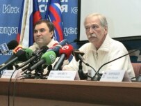 Unified Russia leader Boris Gryzlov (right) speaking to reporters in Moscow today (ITAR-TASS)