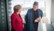 Germany -- Chancellor Angela Merkel (L) talks with Afghan President Hamid Karzai during a meeting at the Chancellery in Berlin, 16May2012