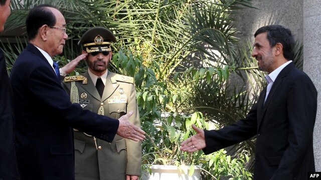 Iranian President Mahmud Ahmadinejad (right) greets North Korea's ceremonial head of state, Kim Yong Nam, in Tehran earlier this year. 