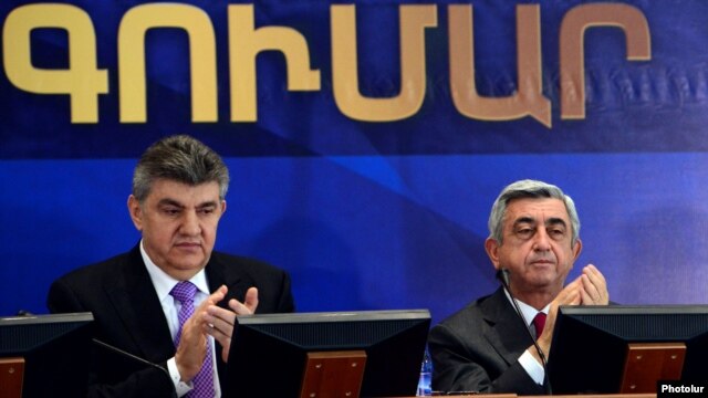 Armenia - President Serzh Sarkisian (R) and Russian-Armenian businessman Ara Abrahamian attend the 2nd convention of the World Armenian Congress (WAC) in Yerevan, 15Oct2012.