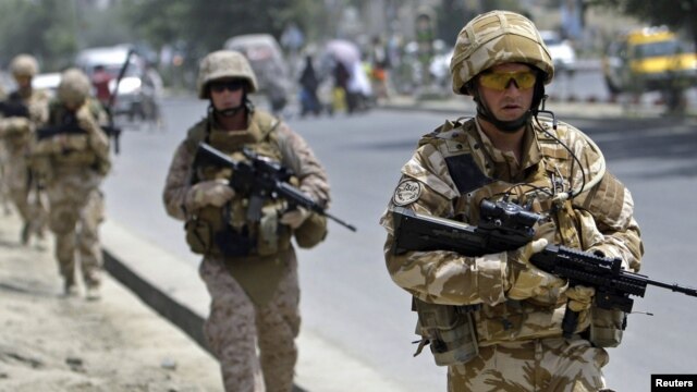 British soldiers patrol a street in Kabul.