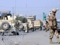 Iraqi soldier at Baghdad checkpoint on February 8 (epa)