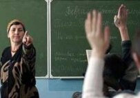 Students in Grozny learning the Chechen language (EPA)