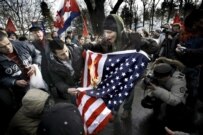 Demonstrators burn U.S. flag in anti-Iraq war protest in Stockholm in March (epa)