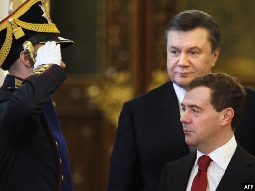 Ukrainian President Viktor Yanukovych with Russian President Dmitry
 Medvedev at the Kremlin in Moscow in early May