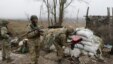 Ukrainian troops at their checkpoint next to Shyrokine village not far Mariupol on March 25. 