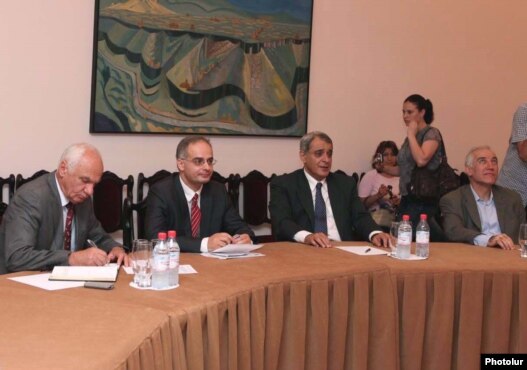 Levon Zurabian (second from left) and other members of the Armenian National Congress negotiate with government representatives earlier this month.