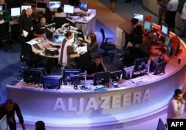 Al-Jazeera said its employees were not working with the Taliban.