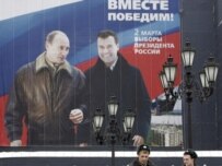Election poster of Putin and Medvedev (AFP)